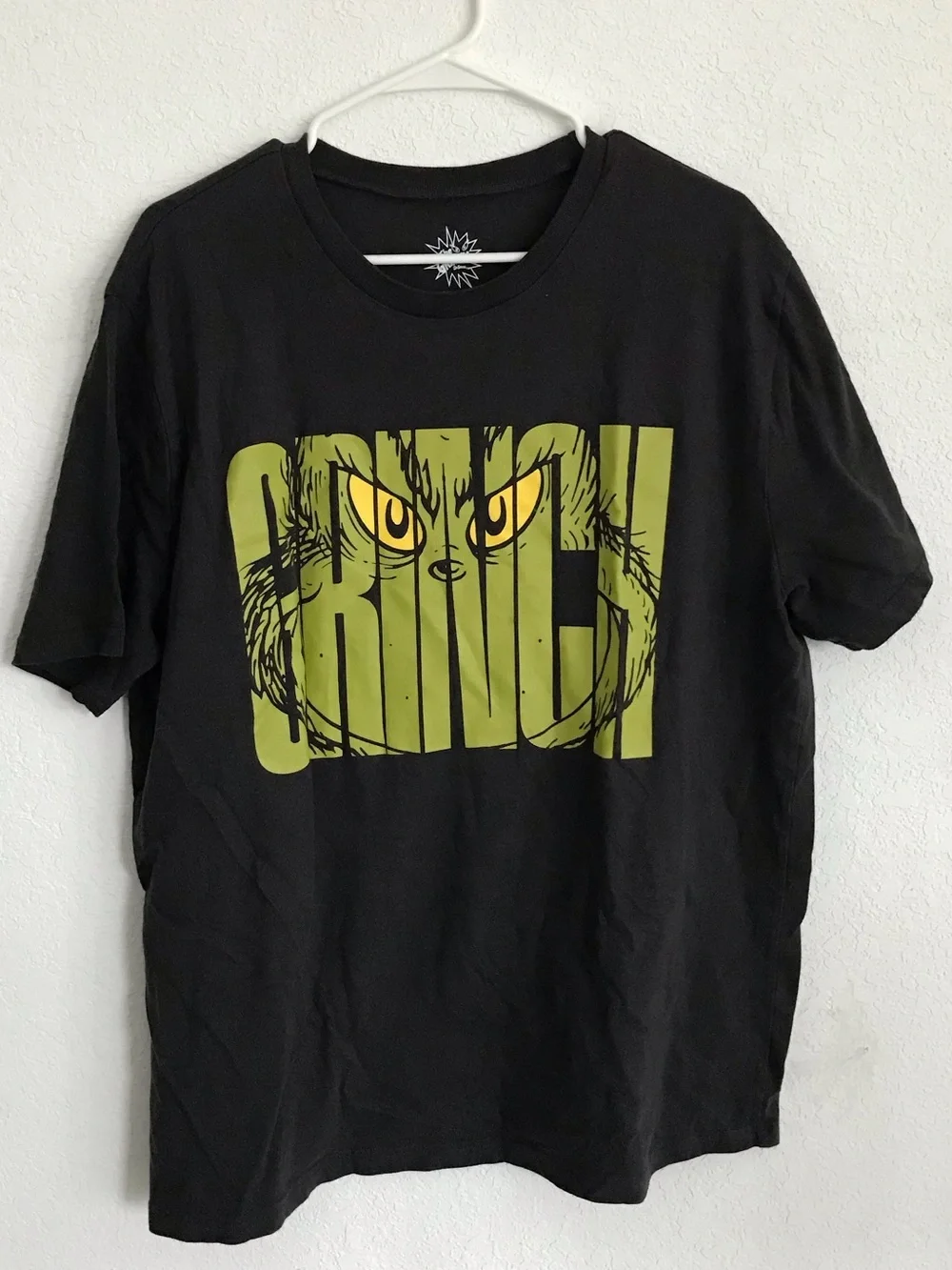 MAD Engine Black Tee with‎ Green Grinch Graphic and Yellow Eyes